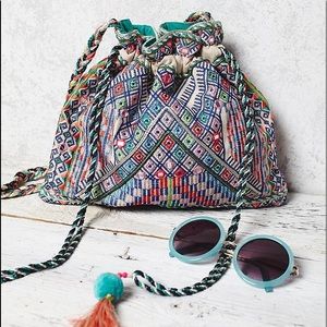 yumi star mela embroidered crossbody bag